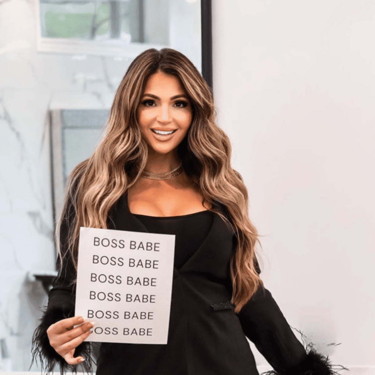Portrait of DIANA FOLINO-UJKAJ, a professional stylist at Runway Salon & Beauty Bar, showcasing their expertise and style.