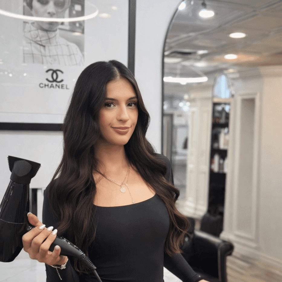 Portrait of LUISJANA STERBYCI, a professional stylist at Runway Salon & Beauty Bar, showcasing their expertise and style.
