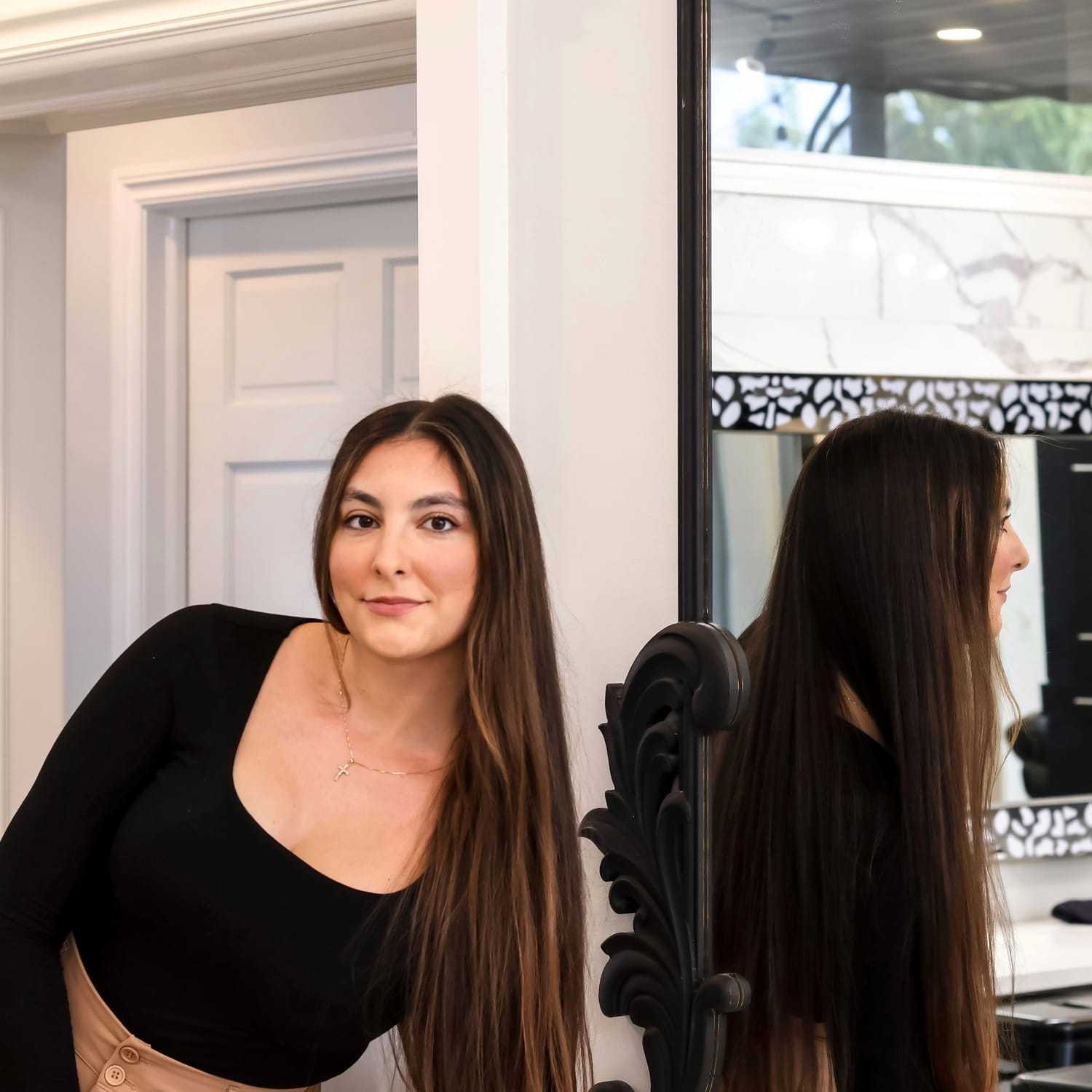 Portrait of NATALIE PARTYKA, a professional stylist at Runway Salon & Beauty Bar, showcasing their expertise and style.