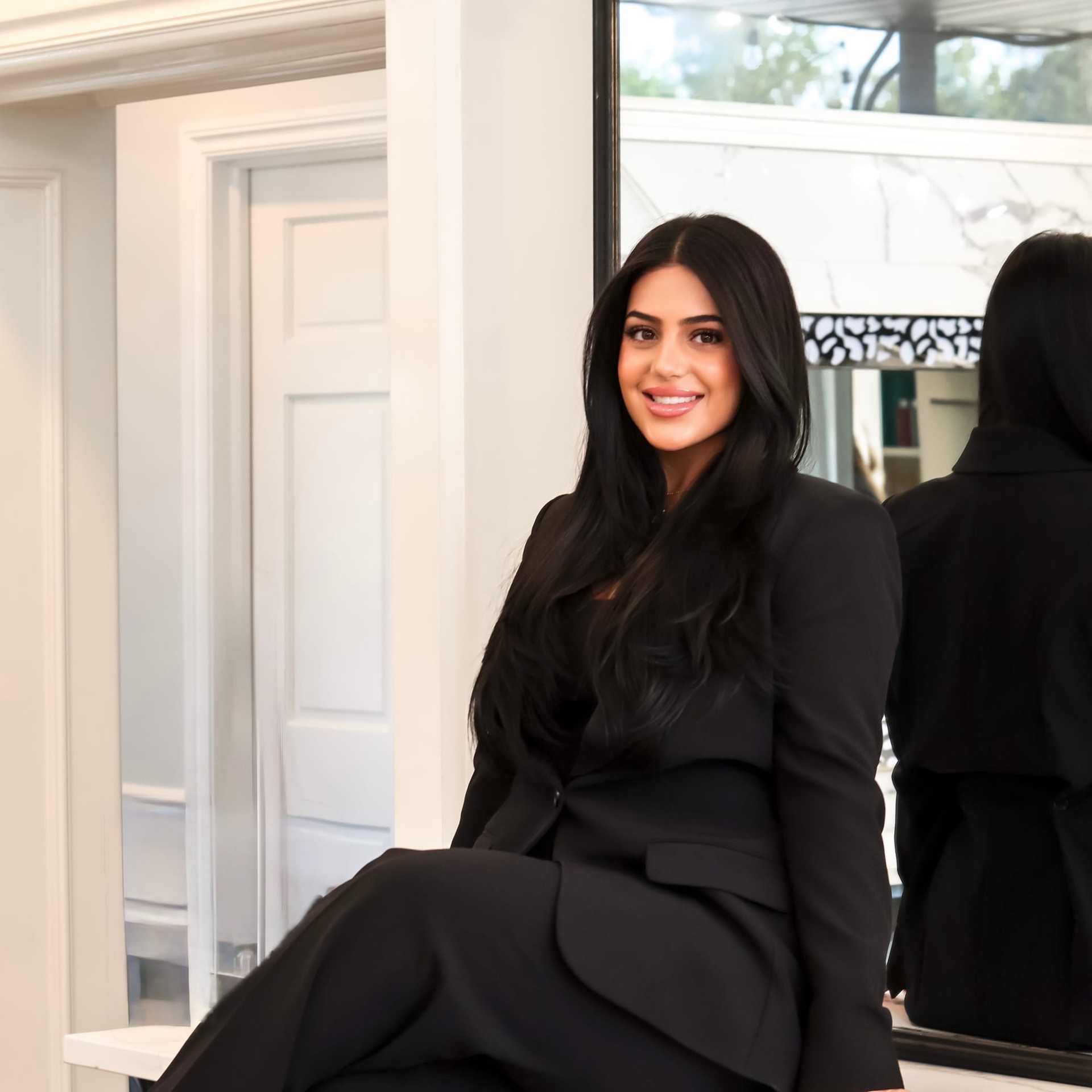 Portrait of ANGELICA NAESO, a professional stylist at Runway Salon & Beauty Bar, showcasing their expertise and style.