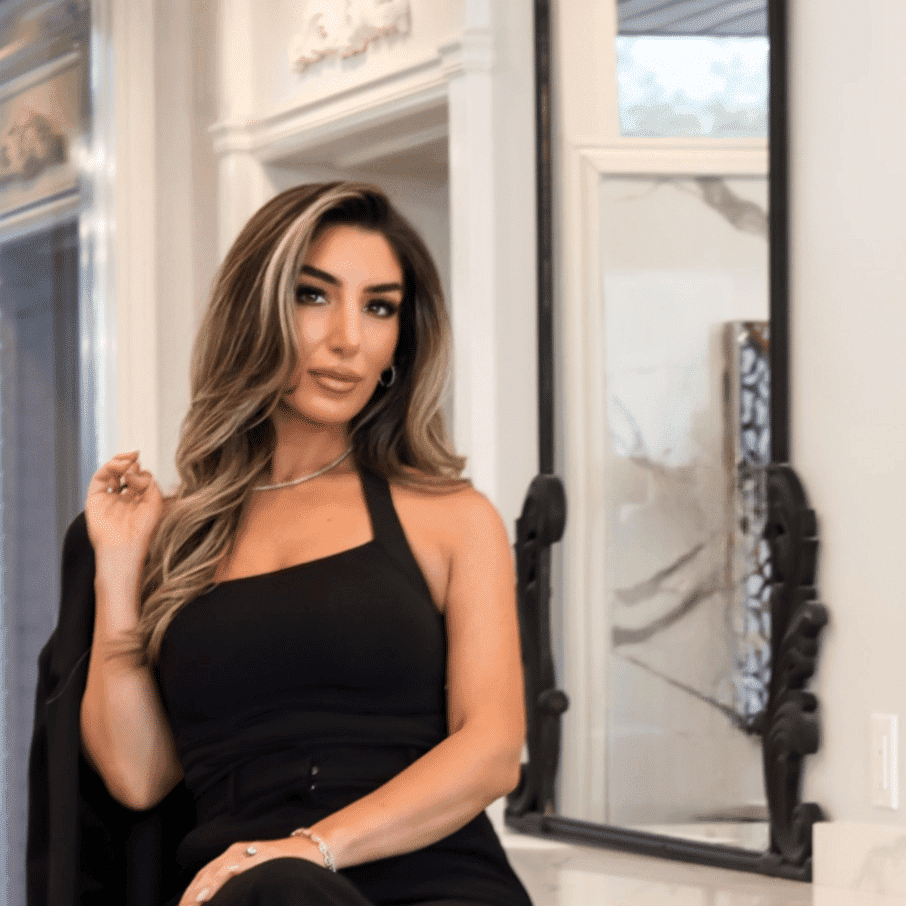 Portrait of OLIVIA D’ONOFRIO, a professional stylist at Runway Salon & Beauty Bar, showcasing their expertise and style.