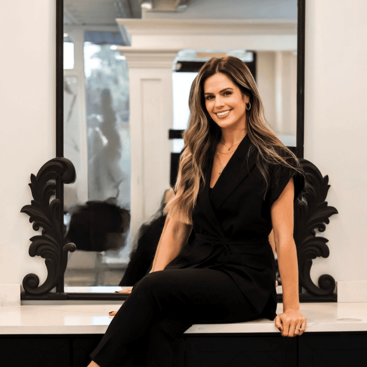 Portrait of LAUREN LESLIE, a professional stylist at Runway Salon & Beauty Bar, showcasing their expertise and style.